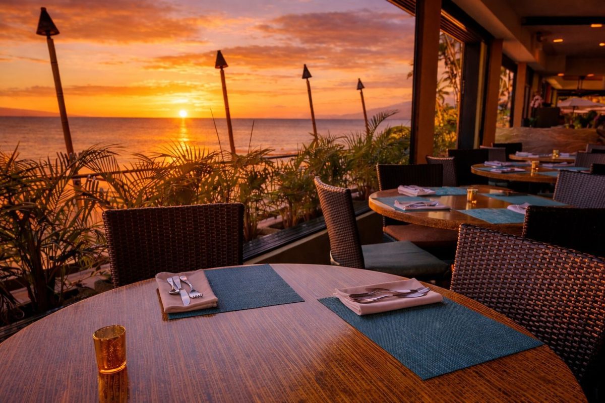 Oceanfront dining at upscale Maui restaurant with sunset and wine service